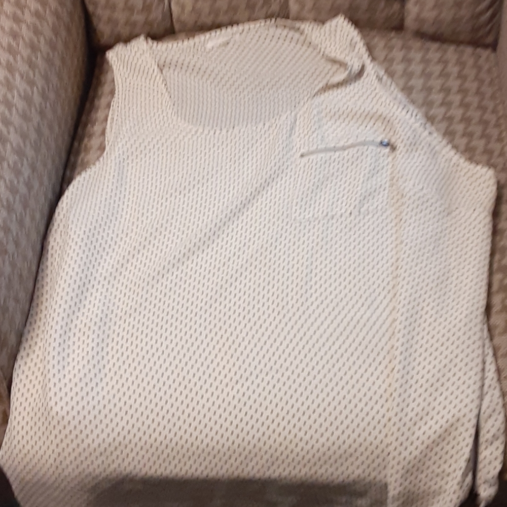 White and black polka dot sleeveless top